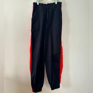 Urban outfitters black pants with red stripe